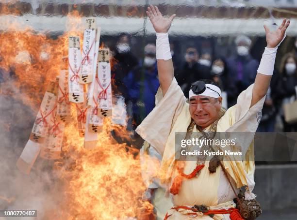 Year-end "otakiage" ritual, in which monks throw charms and amulets onto a temple fire in appreciation for the granting of worshippers' wishes, is...