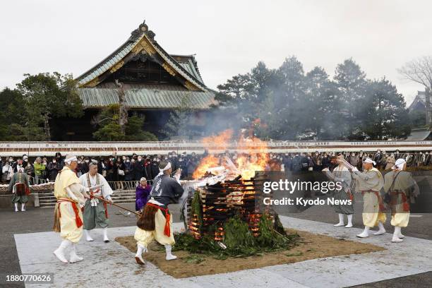 Year-end "otakiage" ritual, in which monks throw charms and amulets onto a temple fire in appreciation for the granting of worshippers' wishes, is...