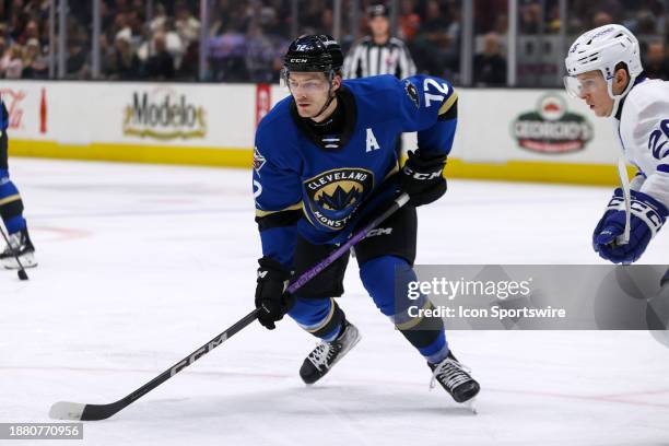 Cleveland Monsters right wing Carson Meyer controls the puck during the second period of the American Hockey League game between the Toronto Marlies...