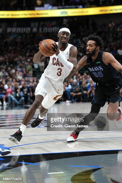 Caris LeVert of the Cleveland Cavaliers handles the ball during the game against the Dallas Mavericks on December 27, 2023 at the American Airlines...