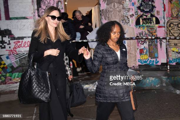 Angelina Jolie and Zahara Jolie-Pitt are seen leaving Atelier Jolie on December 27, 2023 in New York, New York.