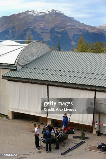 The crew of GBR1, John Jackson, Bruce Tasker, Stu Benson and Craig Pickering of the Great Britain bobsleigh team work on their bobsleigh after a...