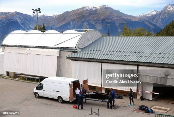 The crew of GBR1, John Jackson, Bruce Tasker, Stu Benson and Craig Pickering of the Great Britain bobsleigh team load up their bobsleigh in to a van...