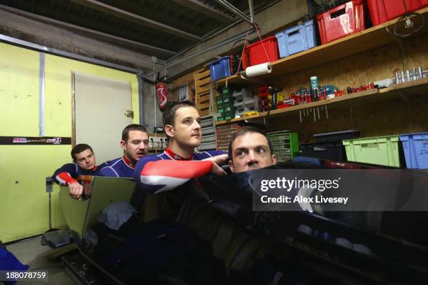 John Jackson, Stuart Benson, Bruce Tasker and Craig Pickering of the Great Britain bobsleigh team sit in their race positions as the GBR1 bobsleigh...