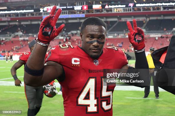 Devin White of the Tampa Bay Buccaneers celebrates the 30-12 win against the Jacksonville Jaguars at Raymond James Stadium on December 24, 2023 in...