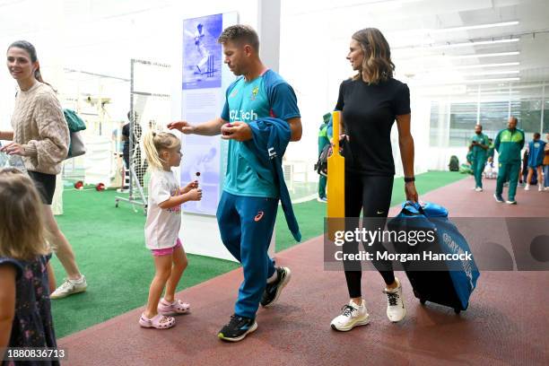 David Warner and Candice Warner leave an Australian Test squad nets session at Melbourne Cricket Ground on December 25, 2023 in Melbourne, Australia.