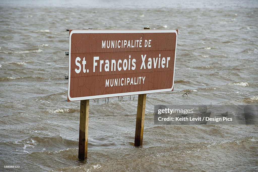 A Municipality Sign In High Water Levels After Flooding