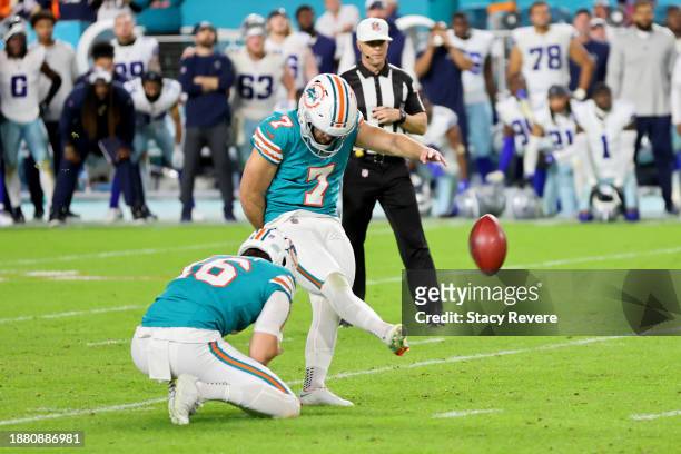 Jason Sanders of the Miami Dolphins kicks a game winning field goal during the fourth quarter in the game against the Dallas Cowboys at Hard Rock...
