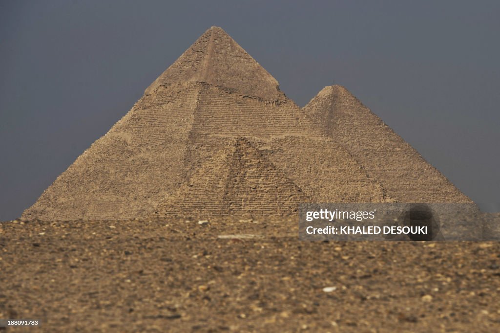 EGYPT-SCENE-PYRAMIDS-TOURISM-HERITAGE-GIZA