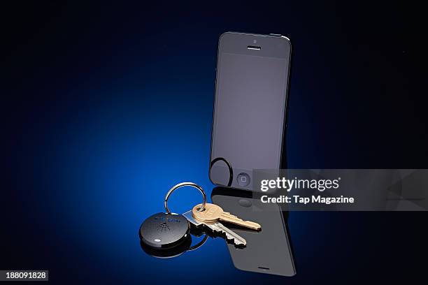 An Apple iPhone 5 alongside a Kensington Proximo Starter Kit photographed for a feature about proximity devices, taken on May 2, 2013.