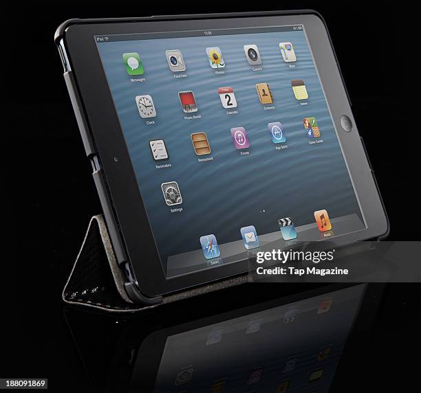 Coolermaster Wake Up Folio Carbon and iPad mini photographed on a black background, taken on April 3, 2013.