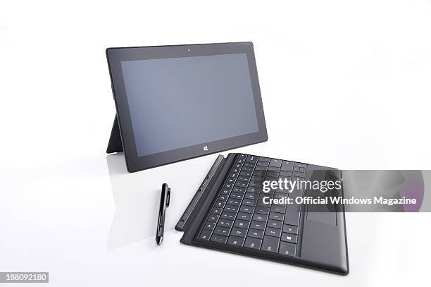 Microsoft Surface Pro tablet PC with keyboard and pen photographed on a white background, taken on April 4, 2013.