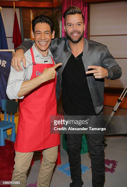 Johnny Lozada and Ricky Martin are seen on the set of Despierta America to promote his new children's book "Santiago el Sonador" at Univision...