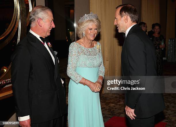 Camilla, Duchess of Cornwall and Prince Charles, Prince of Wales chat to Australian Prime Minister Tony Abbott as they attend the CHOGM Dinner at the...