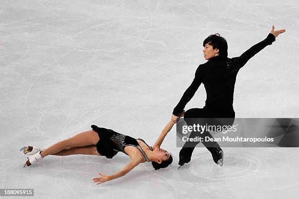 Qing Pang and Jian Tong of China perform in the Paris Short Program during day one of Trophee Eric Bompard ISU Grand Prix of Figure Skating 2013/2014...