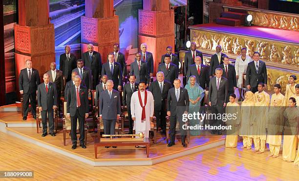 In this handout photo provided by Sri Lankan Government, Commonwealth Secretary-General Kamalesh Sharma, Prince Charles, Prince of Wales, Sri Lankan...