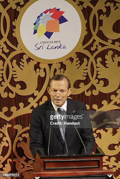 In this handout photo provided by Sri Lankan Government, Prime Minister John Abbot speaks during the opening ceremony of the Commonwealth Heads of...