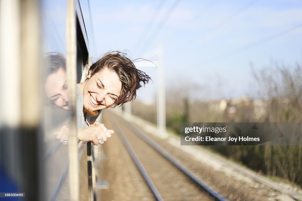 Young woman happy to be travelling