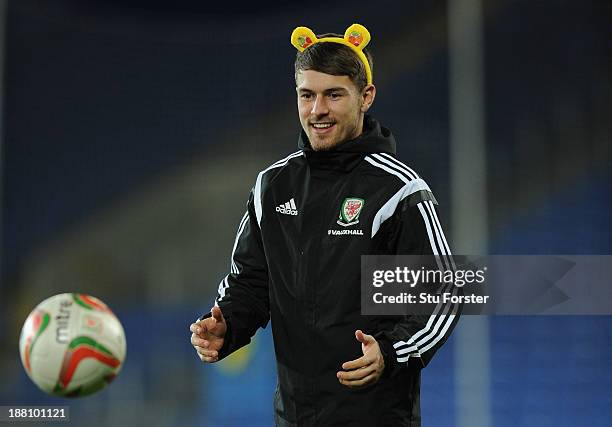 Wales player Aaron Ramsey in action with a set of Pudsey ears, part of the Children in Need Charity campaign during Wales training ahead of their...
