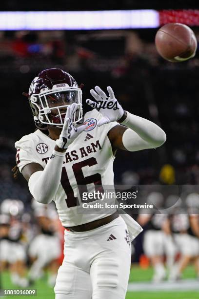 Texas A&M Aggies defensive back Sam McCall warms up before the TaxAct Texas Bowl between the Texas A&M Aggies and Oklahoma State Cowboys at NRG...
