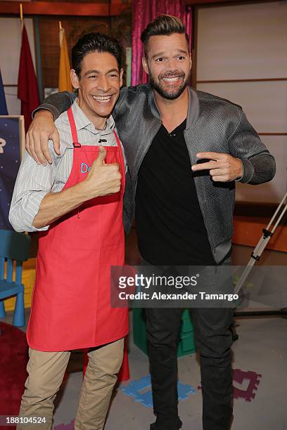 Former Menudo members Johnny Lozada and Ricky Martin are seen on the set of Despierta America at Univision Headquarters on November 15, 2013 in...