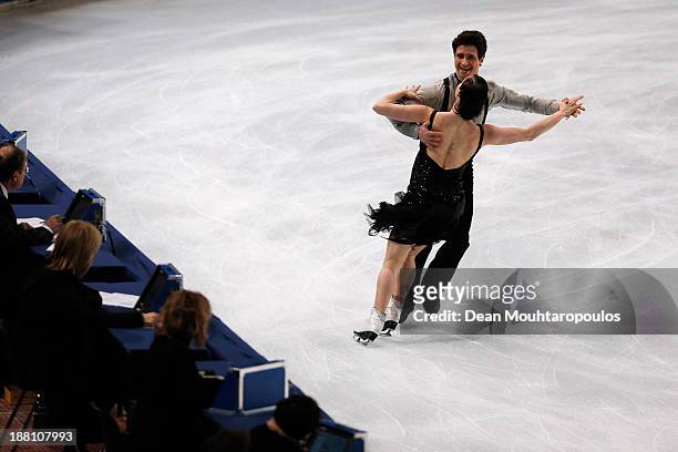 Tessa Virtue and Scott Moir of Canada perform in the Ice Dance Short Dance during day one of Trophee Eric Bompard ISU Grand Prix of Figure Skating...