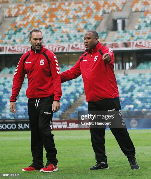 In this handout image, John Barnes and Jason McAteer during the Liverpool FC Legends training session at Mabhida Stadium on November 15, 2013 in...