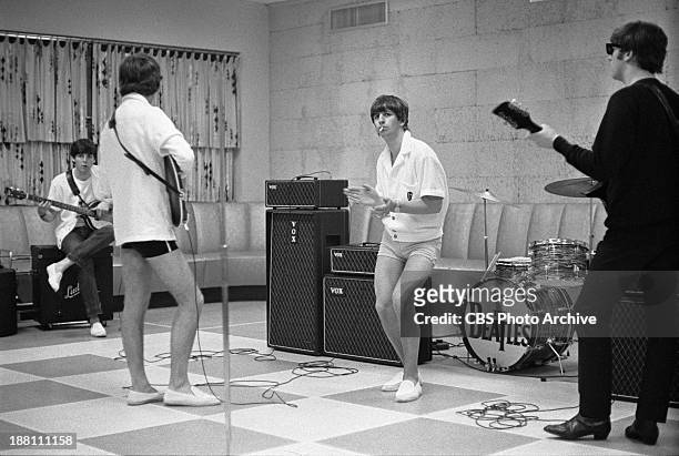 The Beatles rehearsing at the Deauville Hotel, Miami Beach, Florida for THE ED SULLIVAN SHOW. From left: Paul McCartney, George Harrison, Ringo Starr...