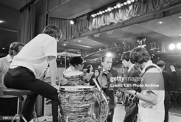 The Beatles at rehearsal in the Deauville Hotel, Miami Beach, Florida for THE ED SULLIVAN SHOW. From left: Ringo Starr, John Lennon, Ed Sullivan Paul...