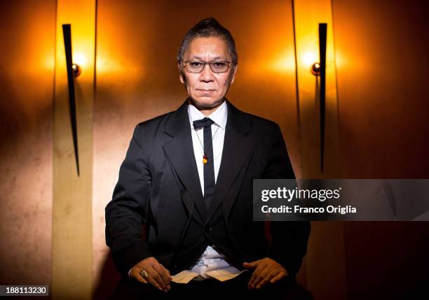 Japanese director Takashi Miike poses for the 'The Mole Song' Portrait Session during The 8th Rome Film Festival at Auditorium Parco Della Musica on...