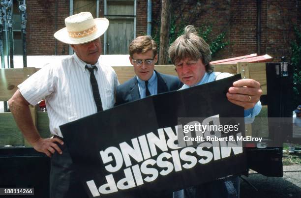 American actors Gene Hackman and Wilem Dafoe and British director Alan Parker on the set of their movie 'Mississippi Burning', Braxton, Mississippi,...