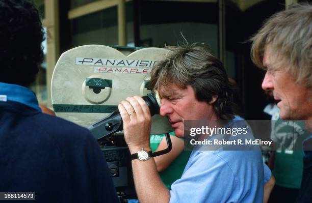 British director Alan Parker lines up a shot in a camera viewfinder on the set of his movie 'Mississippi Burning', Braxton, Mississippi, May 6, 1988.