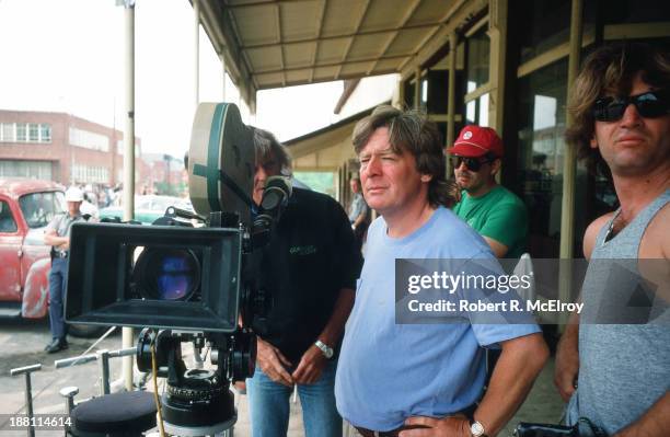 British director Alan Parker stands beside a camera on the set of his movie 'Mississippi Burning', Braxton, Mississippi, May 6, 1988.