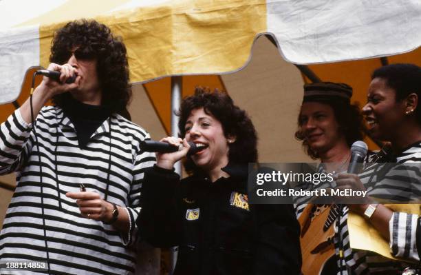 American radio show personalities Howard Stern and Robin Quivers address the crowd, along with another woman , at Howard Stern's 'FCC Freedom Rally'...