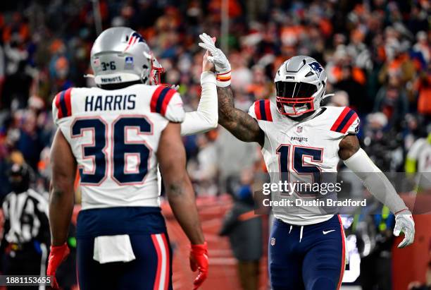 Running back Ezekiel Elliott of the New England Patriots celebrates after a touchdown during the 3rd quarter of the game against the Denver Broncos...