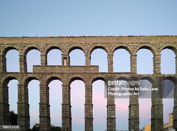 roman aqueduct, segovia - segovia stock pictures, royalty-free photos & images