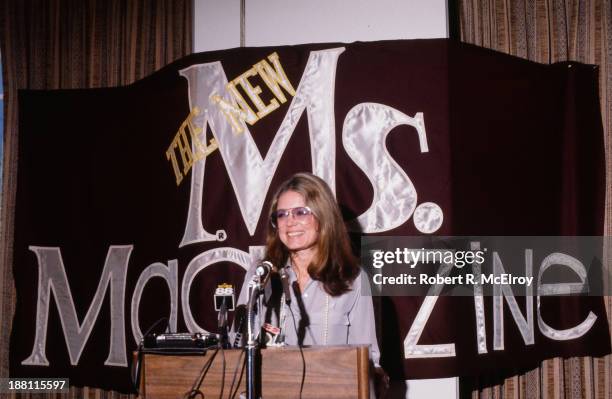 American women's rights activist and author Gloria Steinem speaks from a podium at a press conference about Ms magazine, which she co-founded, 1980s.