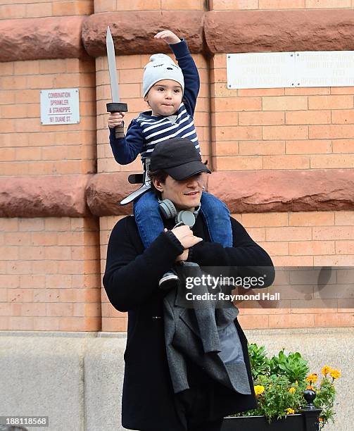 Orlando Bloom and Flynn Bloom are seen Walking in Soho on November 15, 2013 in New York City.