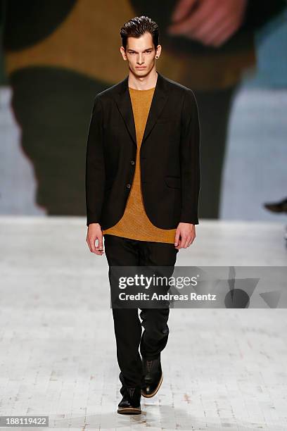 Model walks the runway at the Marc Stone show during Mercedes-Benz Fashion Days Zurich 2013 on November 15, 2013 in Zurich, Switzerland.