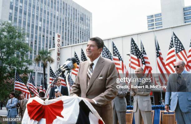 During his presidential campaign, American politician Ronald Reagan speaks in front of a Woolworths department store, Florida, June 1980.