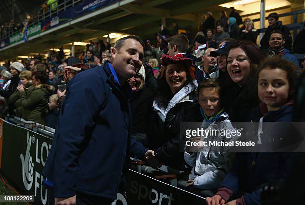 Steve McCormack the manager of Scotland poses with fans on a lap of honour after his sides 4-40 defeat during the Rugby League World Cup Quarter...