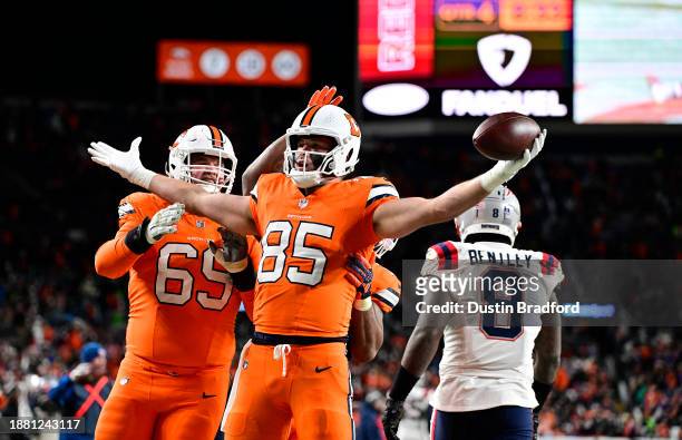 Tight end Lucas Krull of the Denver Broncos celebrates after catching a pass in the endzone for a touchdown during the 4th quarter of the game...