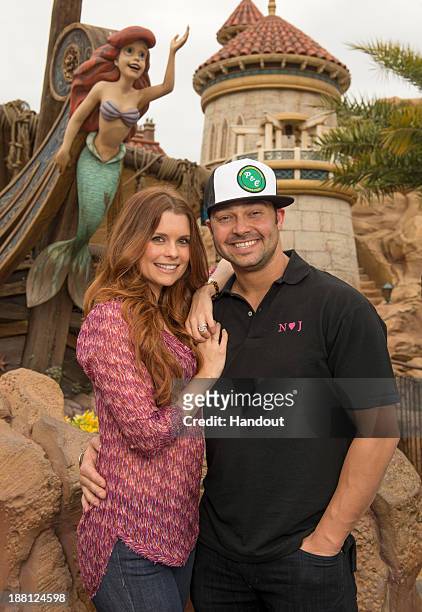 In this handout photo provided by Disney Parks, actress JoAnna Garcia Swisher, who portrays Ariel on the ABC series "Once Upon A Time," poses with...