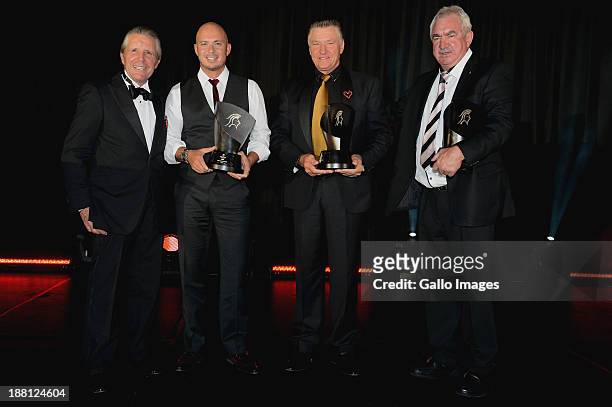 Gary Player poses with the winning four ball team, Herschelle Gibbs, Chris Potgieter and Harry Rossouw during the Gala Dinner and Charitable Auction...