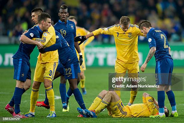 Laurent Koscielny of France reacts after he was sent off during the FIFA 2014 World Cup Qualifier Play-off First Leg soccer match between Ukraine and...