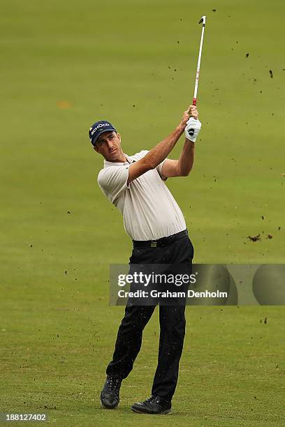 Geoff Ogilvy of Australia plays an approach shot during round three of the 2013 Australian Masters at Royal Melbourne Golf Course on November 16,...