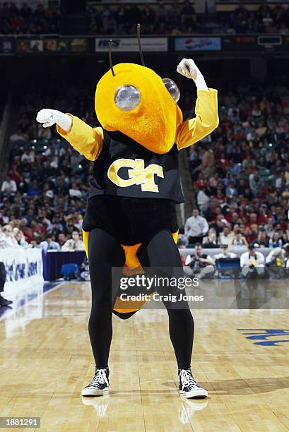 The Georgia Tech Yellowjacket mascot cheers on court during the quarter final game of the ACC Tournament against North Carolina State on March 14,...