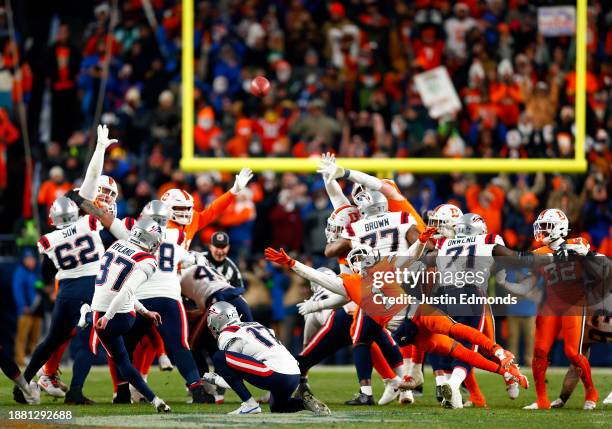 Place kicker Chad Ryland of the New England Patriots kicks a field goal late in the 4th quarter during the game against the Denver Broncos at Empower...