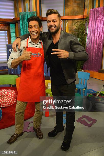 Johnny Lozada and Ricky Martin are seen on the set of Univisions "Despierta America" on November 15, 2013 in Miami, United States.