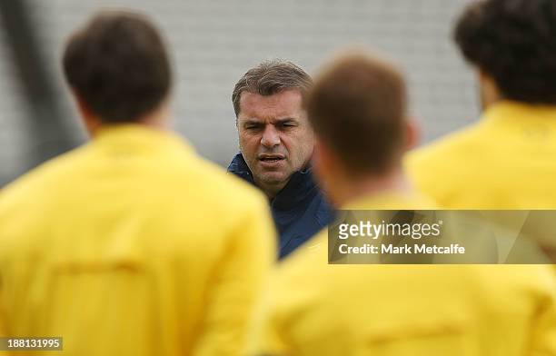 New Socceroos head coach Ange Postecoglou talks to the players during an Australian Socceroos training session at WIN Jubilee Stadium on November 16,...